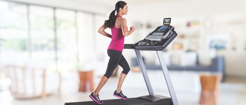 Woman running on ProForm Premier 900 treadmill