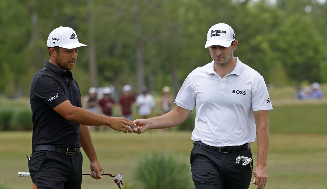 Xander and Patrick shake hands