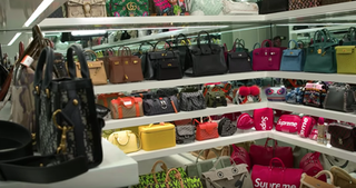 Boutique, Outlet store, Room, Retail, Fashion accessory, Shelf, Handbag, Bag,
