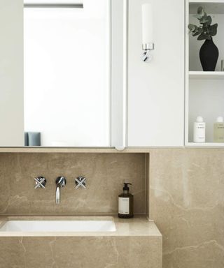 neutral bathroom with cabinet