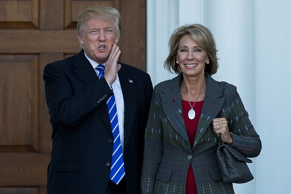 Donald Trump and Betsy DeVos.