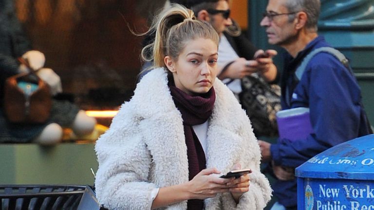 Winter, Street fashion, Toy, Fur, Scarf, Fur clothing, Stole, Natural material, Animal product, Shawl,