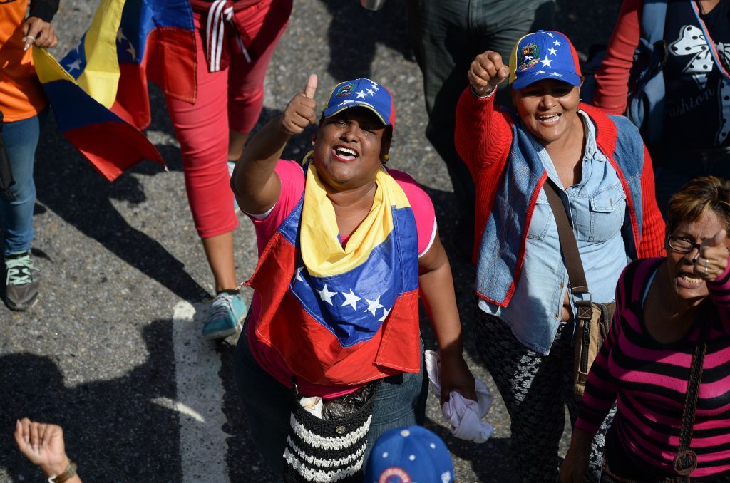 Opposition activists pour to the streets to back Venezuelan opposition leader Juan Guaido&amp;#039;s calls for early elections, in Caracas on February 2, 2019.