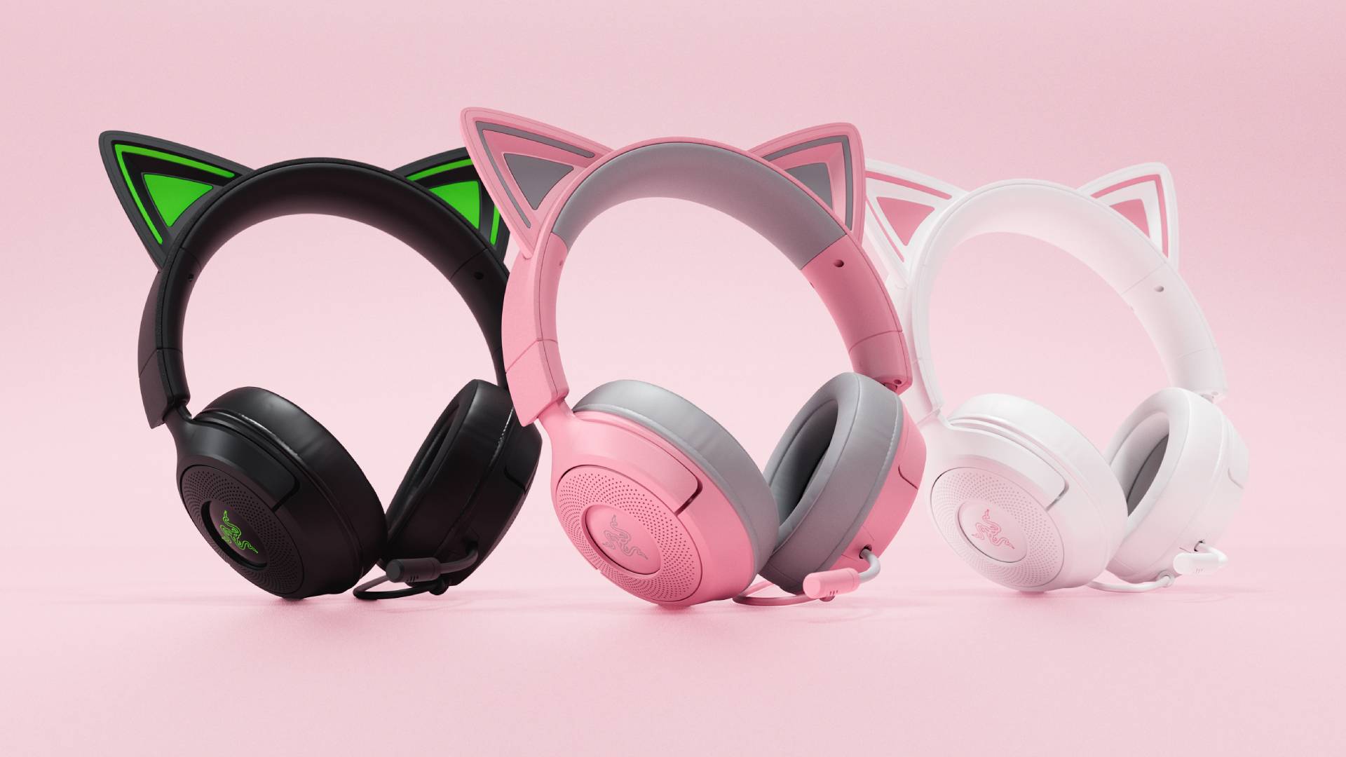 Official promo image of the lineup of Kraken Kitty V3 X headsets, with a pink background.