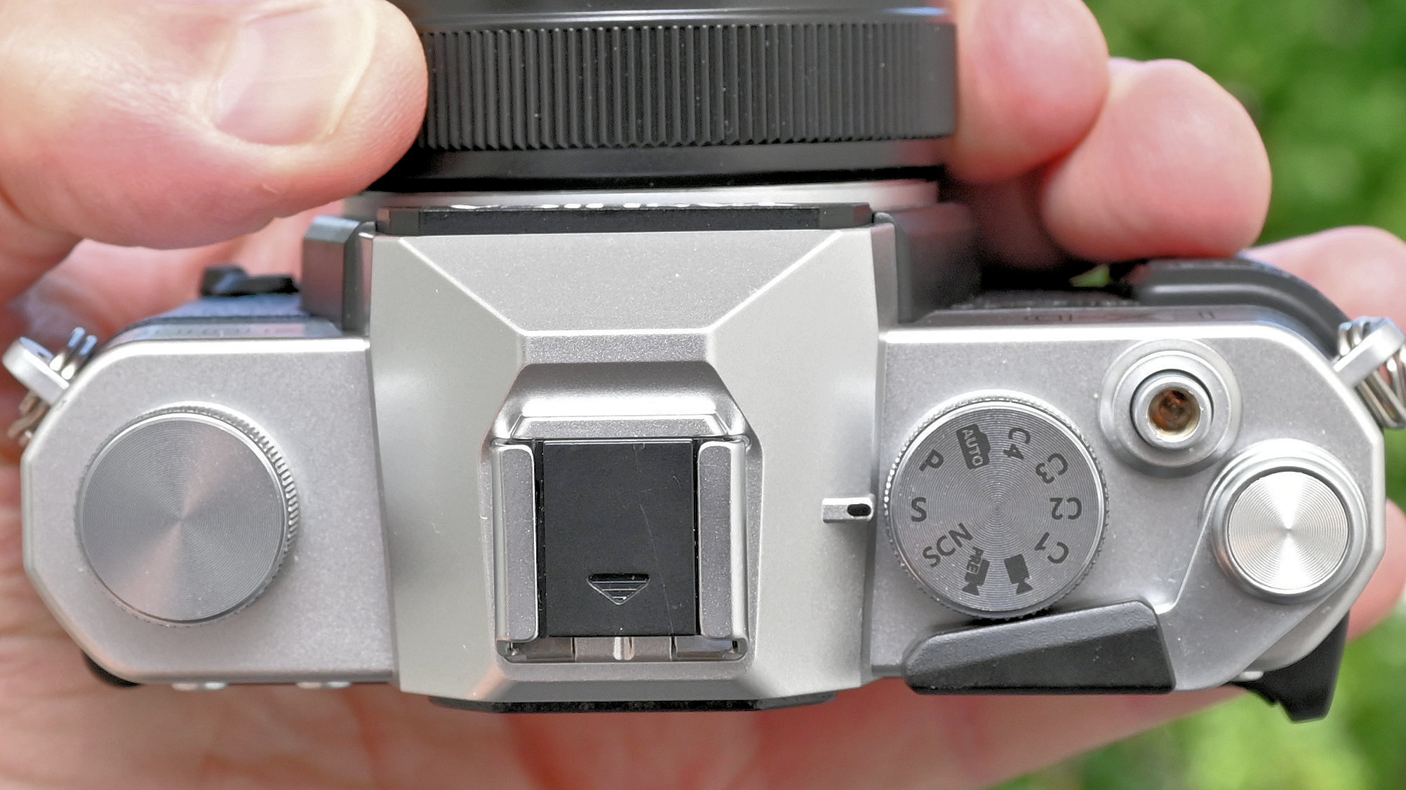 Yashica FX-D 300 product shot, camera held in hand