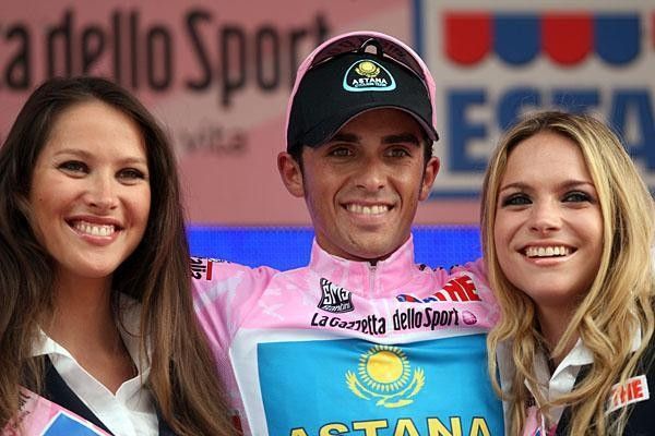 Alberto Contador on the podium after holding the maglia rosa.