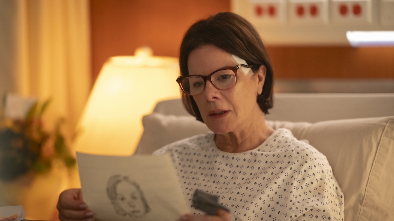 Mayor Holman in her hospital bed in Murder in a Small Town 2x09