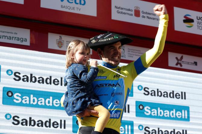 Ion Izagirre celebrates on the podium with his daughter