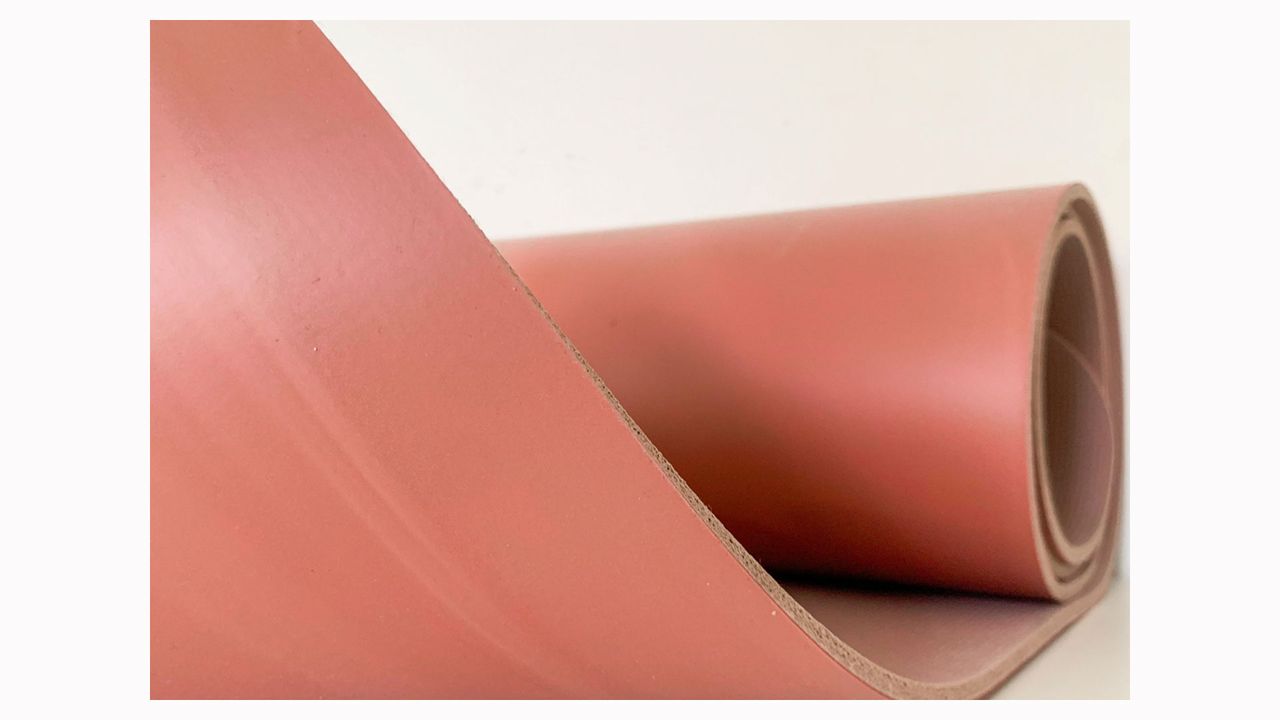Image shows a closeup of the textures of the pink Lululemon Reversible 5mm Yoga Mat.