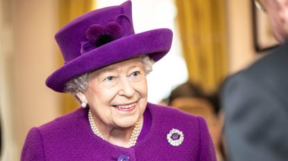 Queen Elizabeth II talks with residents in the new Appleton Lodge care facility run by the RBLI during a visit to the Royal British Legion Industries village to celebrate the charity's centenary year on November 6, 2019