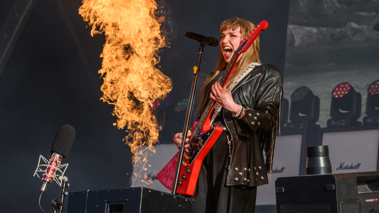 Lzzy Hale surrounded by fire