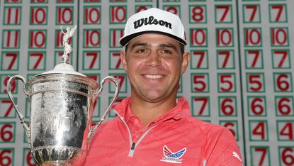American golfer Gary Woodland poses with the trophy after winning the 2019 US Open