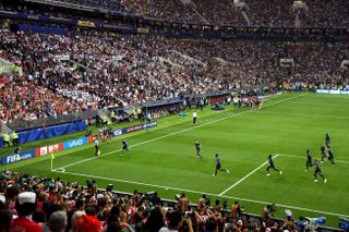 France players celebrate their first goal against Croatia, scored by Antoine Griezmann, at the Luzhniki Stadium in the 2018 World Cup final.