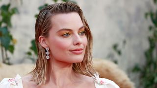 Margot Robbie is pictured with a wet-look, mid-length bob whilst attending the 'Goodbye Christopher Robin' World Premiere held at Odeon Leicester Square on September 20, 2017 in London, England.