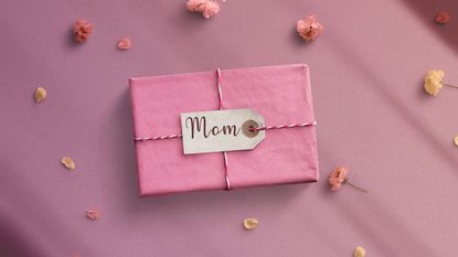 wrapped gift for mom for Mother's Day retirement savings