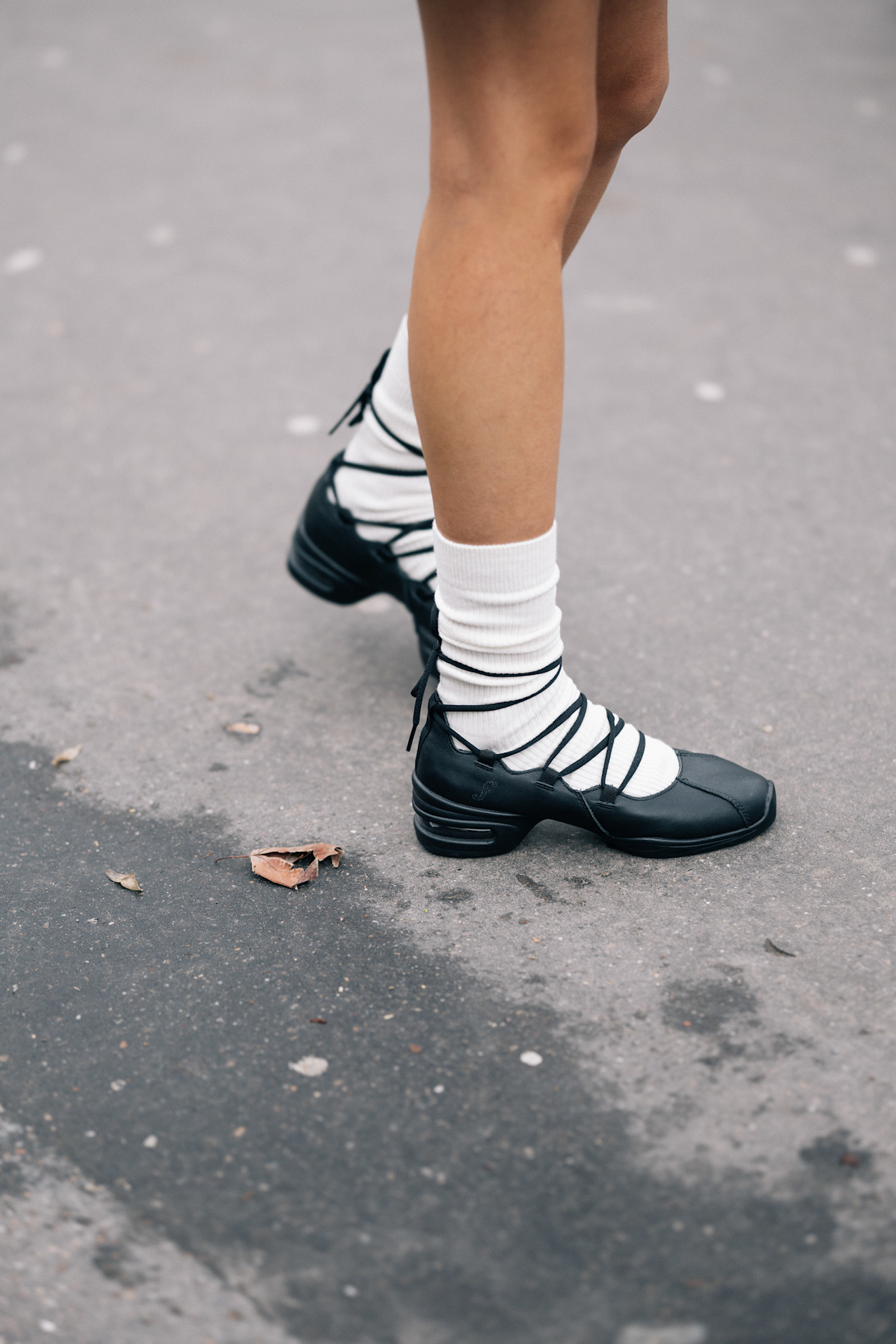 woman wearing ballerina sneakers in Paris