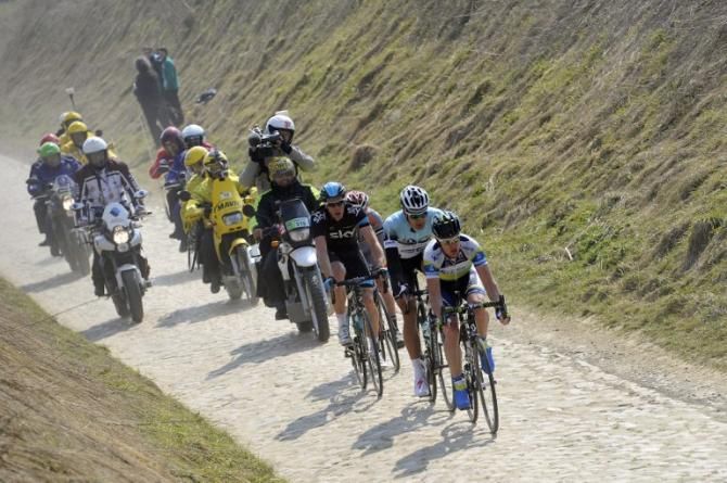 Australian Stuart O'Grady (Orica Greenedge) leads a bunch of riders