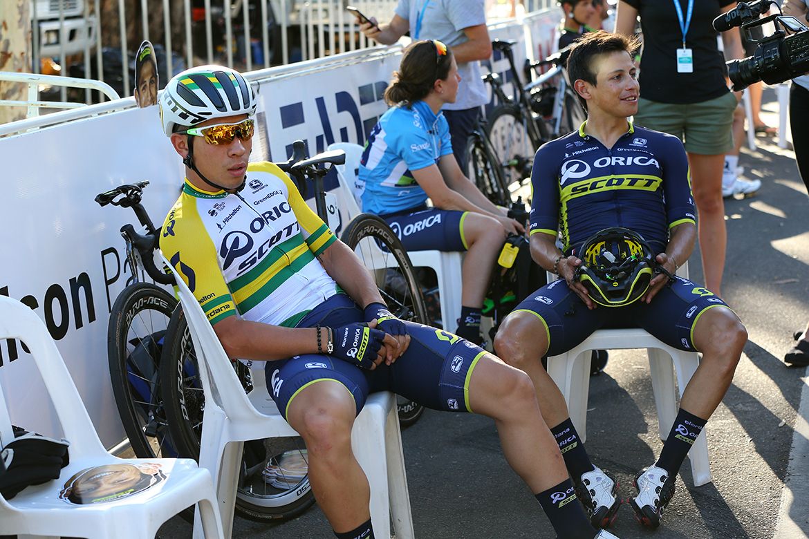 The media attention on Caleb Ewan and Esteban Chaves, with women's race leader Amanda Spratt in the background
