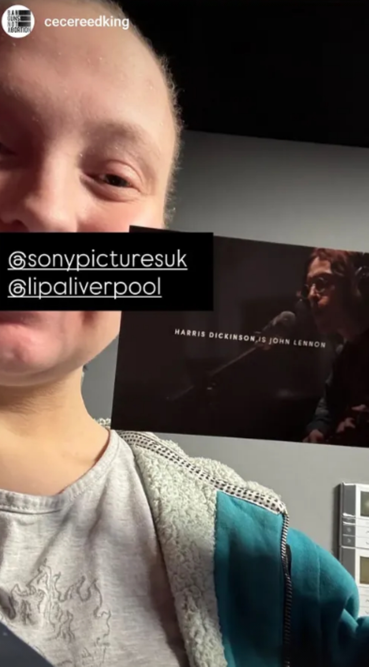 LIPA student holding postcard of Harris Dickinson as John Lennon