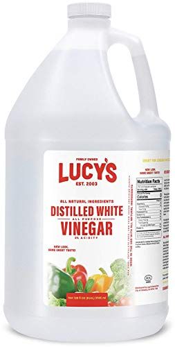  1 Gallon plastic bottle of 5% Acidity Lucy's Distilled White Vinegar labelled as such with images of peppers and broccoli on the bottom edge of product label