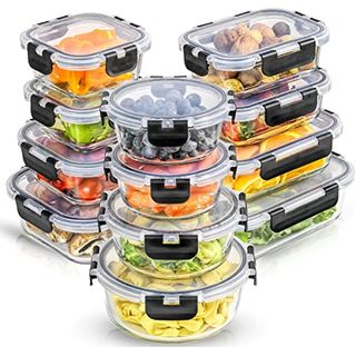 Three stacks of four lidded containers with fresh product including fruit, veg and cooked pasta inside.