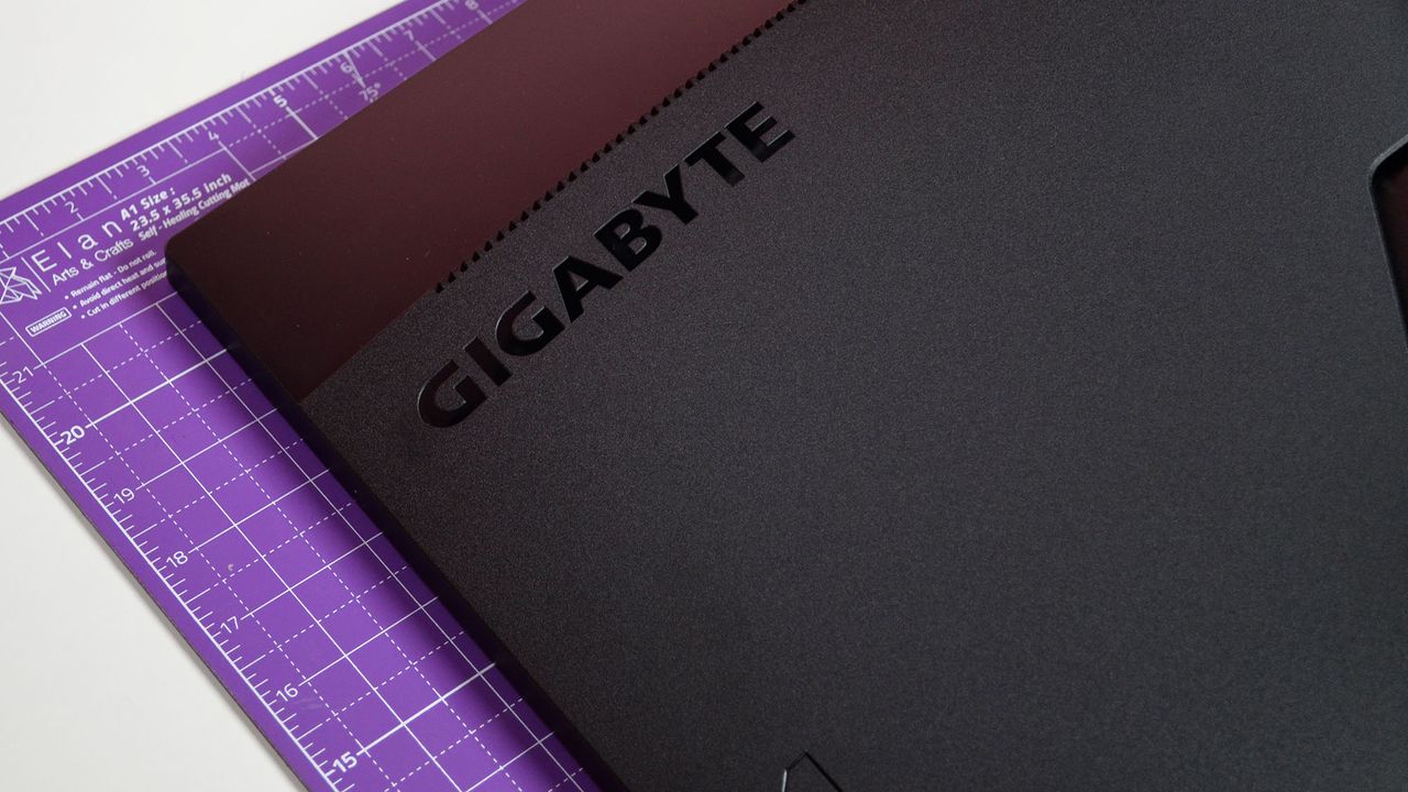 A Gigabyte GS34WQC gaming monitor on a desk