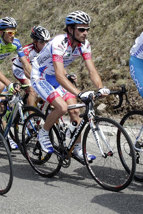 Michele Scarponi (Androni Giocattoli) climbs in the peloton