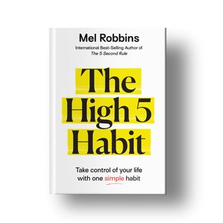 A copy of Mel Robbins' book, The High 5 Habit