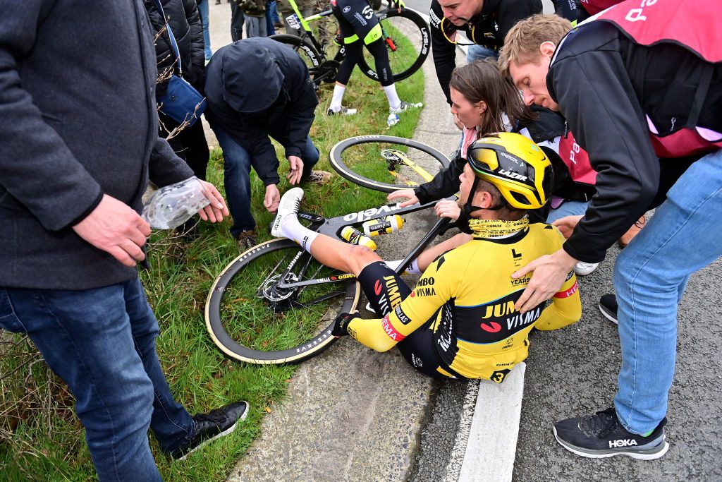 OUDENAARDE BELGIUM APRIL 02 Tosh Van Der Sande of Belgium and Team JumboVisma after being involved in a crash during the 107th Ronde van Vlaanderen Tour des Flandres 2023 Mens Elite a 2734km one day race from Brugge to Oudenaarde UCIWT on April 02 2023 in Brugge Belgium Photo by Dirk Waem PoolGetty Images
