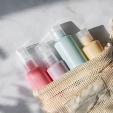 a picture of beauty bottles - beauty travel kits