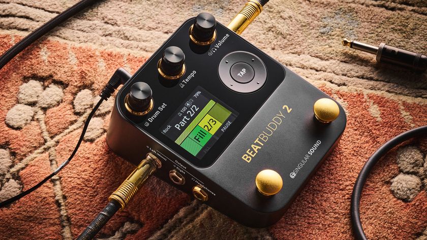 A Singular Sound BeatBuddy 2 drum machine pedal on a rug