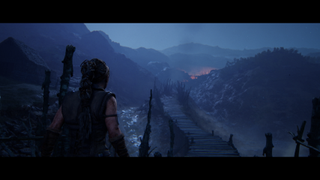 Making Senua's Saga Hellblade 2, the Ninja Theory interview: a woman walks along a wooden bridge