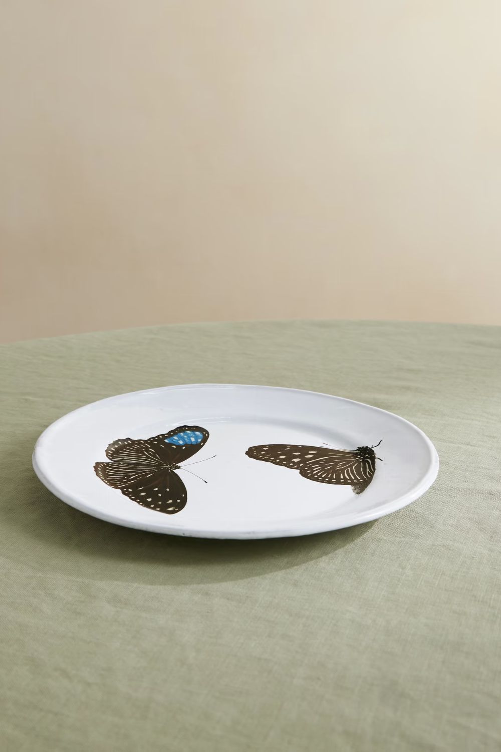 White plate with butterfly motifs