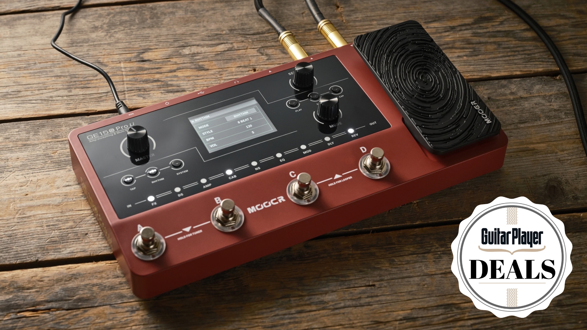A Mooer GE150 Pro Li multi-effects pedal on a wooden floor