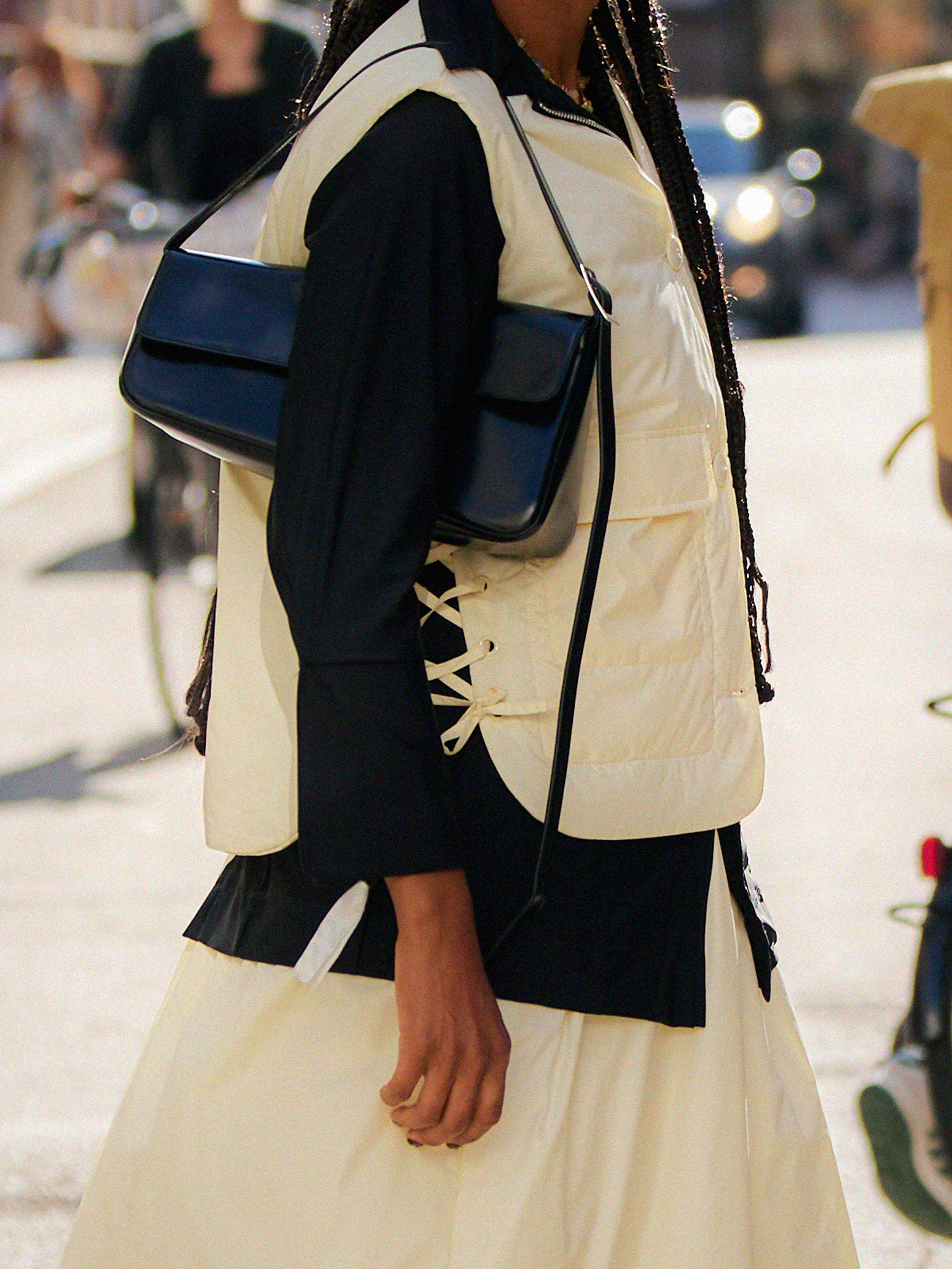 Close up of woman wearing black bag