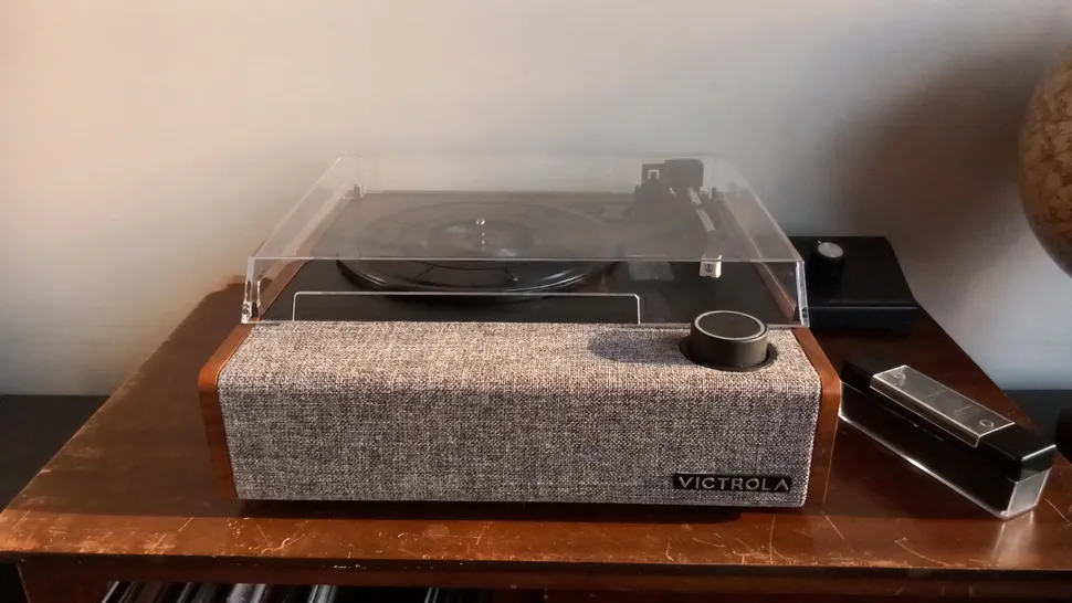 The Victrola Eastwood II turntable on a wooden surface