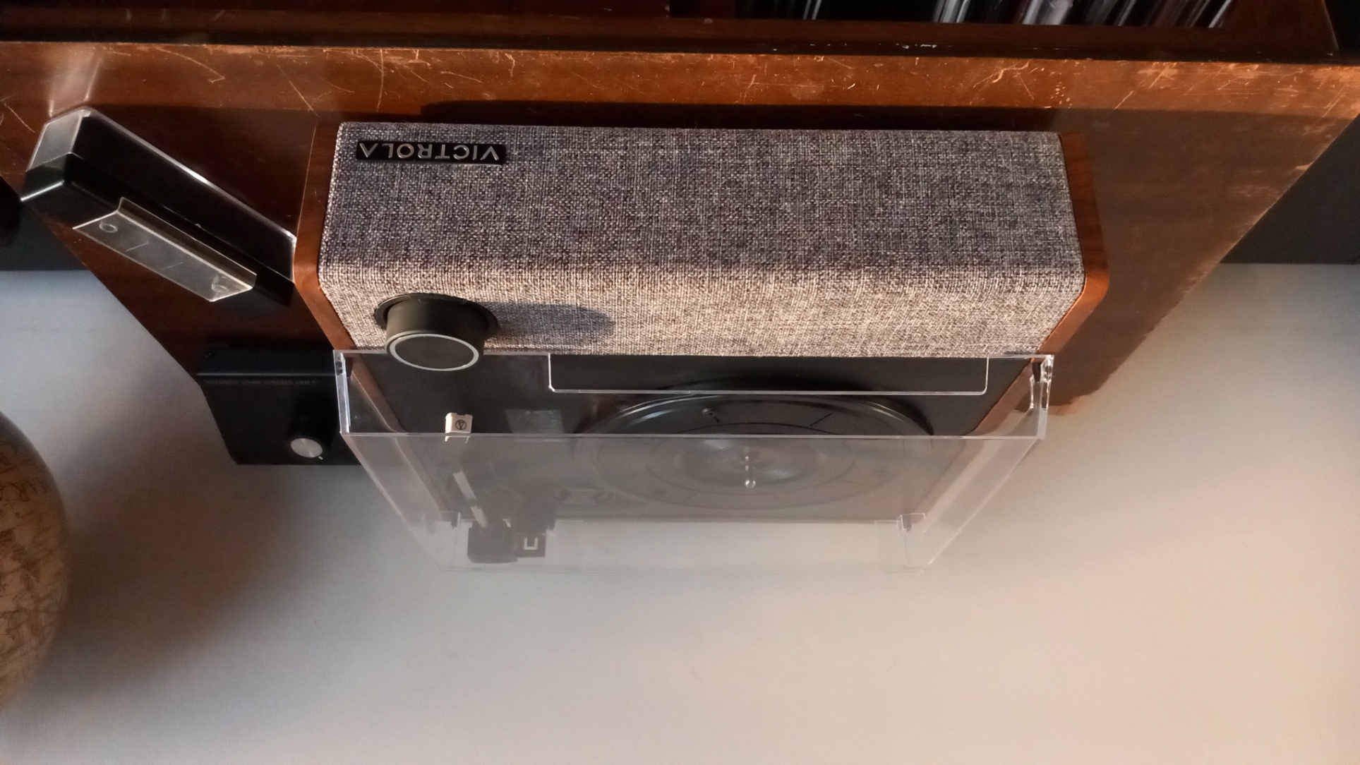 The Victrola Eastwood II turntable on a wooden surface