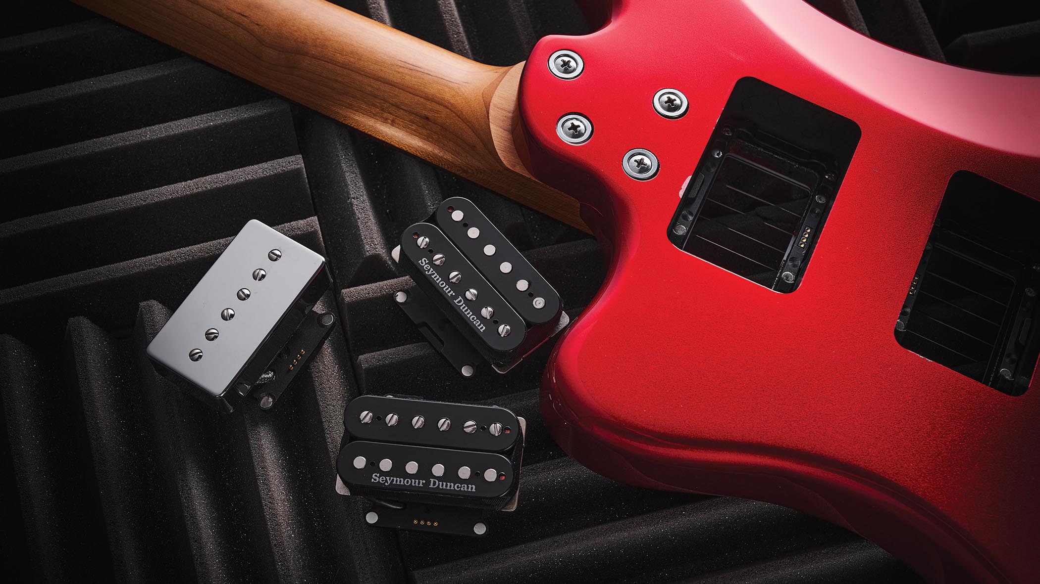The red hardtail pickup-swapping offset is made in China, and comes with three Seymour Duncan and Guitar-X pickups included