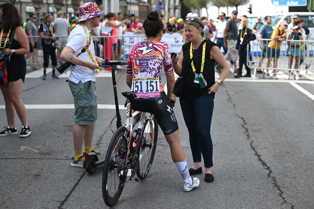 Kirsten Frattini conducts an interview with French rider Audrey Cordon-Ragot at the 2024 Tour de France Femmes
