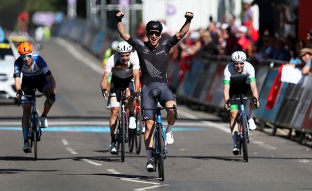 WARWICK ENGLAND AUGUST 07 Aaron Gate of Team New Zealand celebrates winning Gold in the Mens Road Race on day ten of the Birmingham 2022 Commonwealth Games at on August 07 2022 on the Warwick England Photo by Alex LiveseyGetty Images