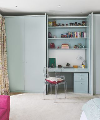 Decorating small spaces with pale blue-gray built-in storage in a neutral bedroom with cream carpet.