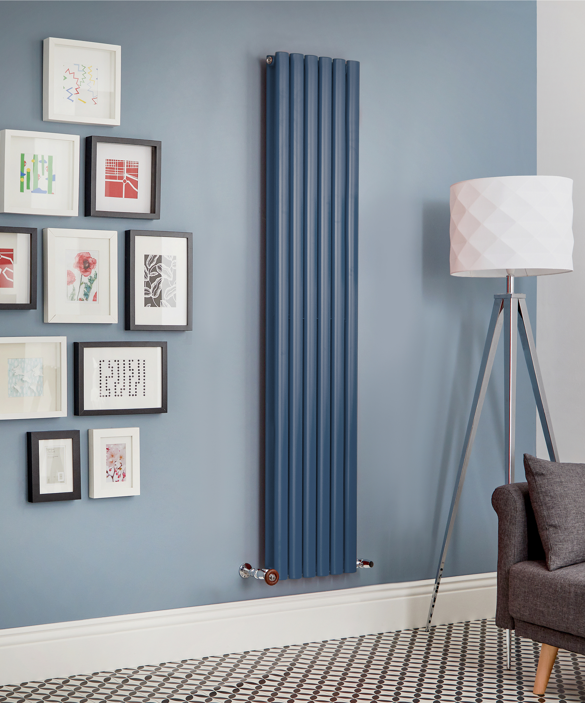 tall blue vertical radiator on paler blue wall in living room