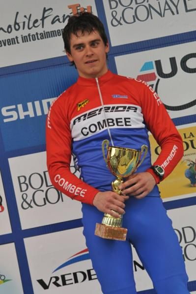Junior men's World Cup cross country winner Michiel Van Der Heijden on the podium in Houffalize.