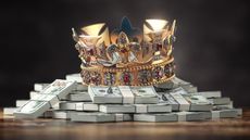 a jeweled crown placed on top of stacks of hundred-dollar bills