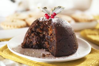 Close up of a festive Christmas pudding sliced in half