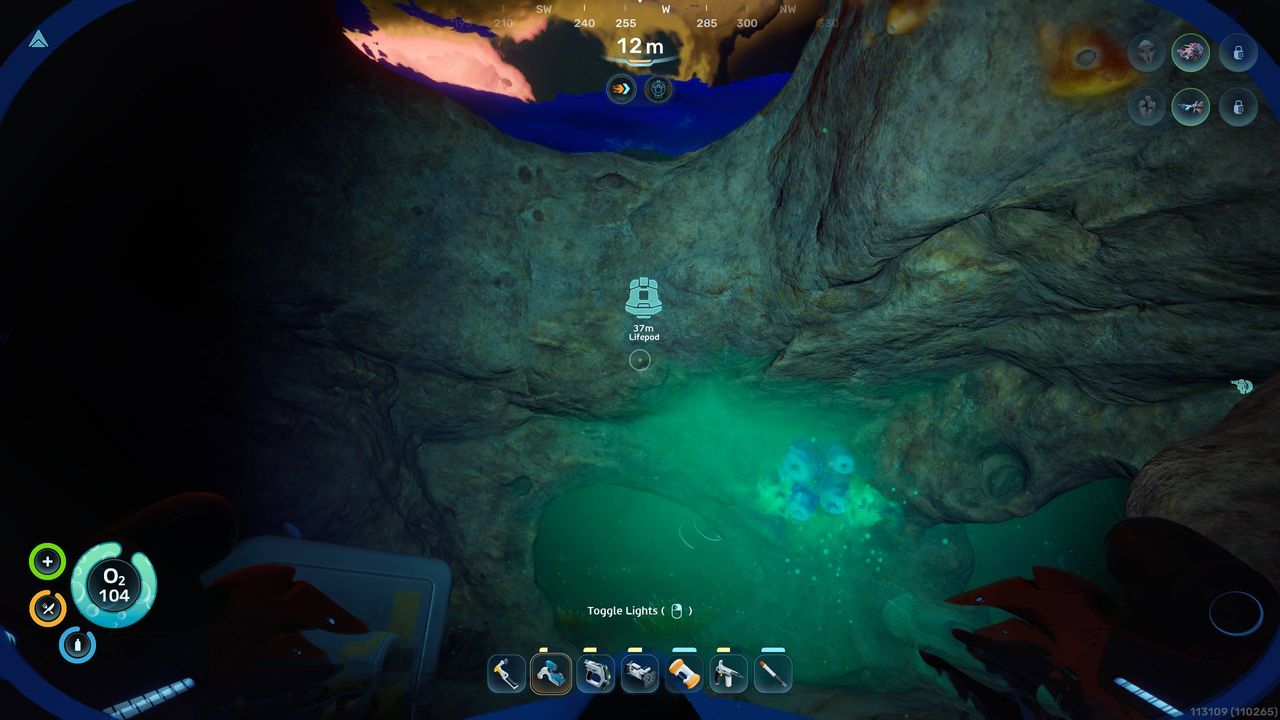 Subnautica 2 Biomods: A player looking at a Toxic Sponge inside a cave near the Lifepod.