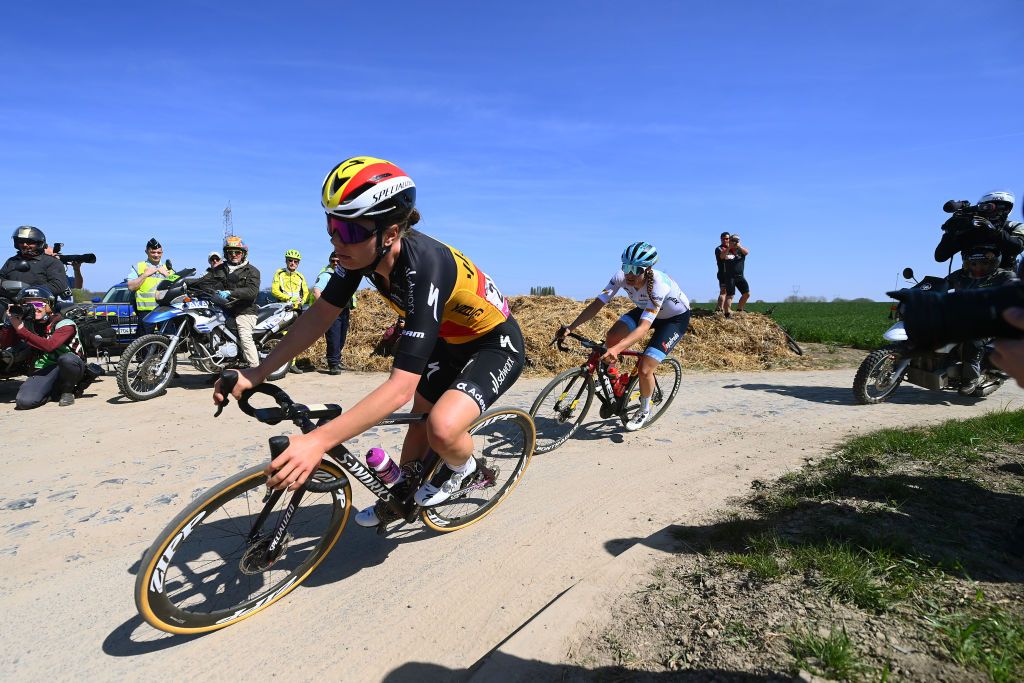 ROUBAIX FRANCE APRIL 16 LR Lotte Kopecky of Belgium and Team SD Worx and Lucinda Brand of Netherlands and Team Trek Segafredo compete in the breakaway passing through a cobblestones sector during the 2nd ParisRoubaix 2022 Womens Elite a 1247km one day race from Denain to Roubaix ParisRoubaixFemmes ParisRoubaix on April 16 2022 in Roubaix France Photo by Tim de WaeleGetty Images