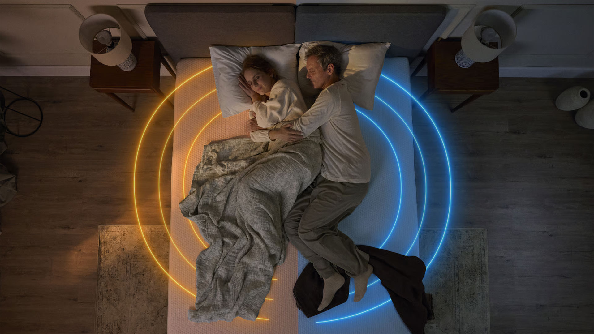 A couple sleeping on the Emma Original Pro mattress