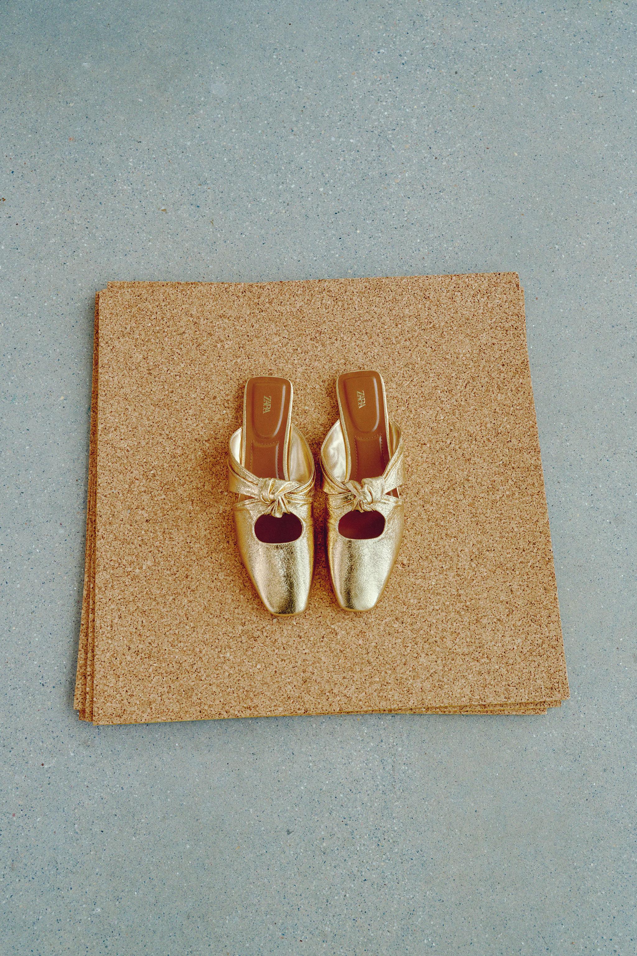 Zara Spring Shoe Trends 2025: A pair of gold bow flats from Zara