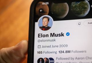 Phone screen of Elon Musk Twitter profile